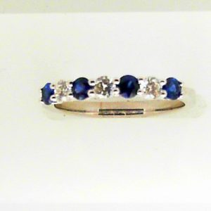 Sapphires Ring 
18 Karat White Blue Sapphires Ring With Finger Size 6.5 
 
4 Center Sapphires Shape: Round; Colour: Blue With 3 Round Diamonds 0.23 ctw