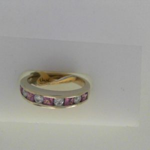 Sapphires Estate Ring 
14 Karat White Pink Sapphires Ring With Finger Size 6 
Width 2.63mm Gram Weight 3.33 
5 Center Sapphires Shape: Princess; Colour: Pink With 4 Round Diamonds 0.25 ctw