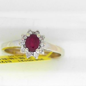 Ruby Estate Ring 
14 Karat White Ruby Ring With Finger Size 9 
Width 2.38mm Gram Weight 3.13 
1 Center Ruby 0.45ct Shape: Oval With 10 Round Diamonds 0.15 ctw