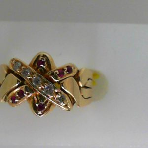 Diamonds Estate Ring 
14 Karat Yellow Diamonds Ring With Finger Size 4.75 
 Gram Weight 6.42 
5 Center Diamonds Shape: Round With 6 Round Rubies