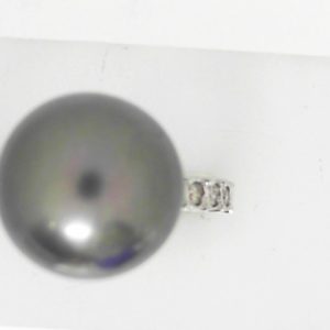Pearl Estate Ring 
14 Karat White Black Pearl Ring With Finger Size 8 
 Gram Weight 5.7 
1 Center Pearl Shape: Round; Colour: Black With 8 Round Diamonds 0.15 ctw
