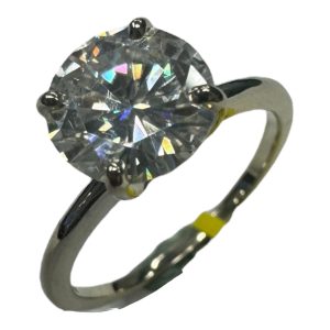 Moissanite Estate Ring 
14 Karat White Moissanite Ring With Finger Size 8.25 
 Gram Weight 3.06 
1 Center Moissanite Shape: Round