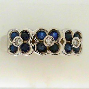 Sapphires Estate Ring 
14 Karat White Blue Sapphires Ring With Finger Size 6.75 
 Gram Weight 5.8 
12 Center Sapphires Shape: Round; Colour: Blue With 3 Round Diamonds