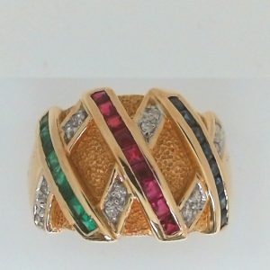 Rubies Estate Ring 
14 Karat Yellow Rubies Ring With Finger Size 8.25 
 Gram Weight 8.02 
9 Center Rubies Shape: Various Shapes With 8 Various Shapes Sapphires and 8 Various Shapes Emeralds and 12 Round Diamonds