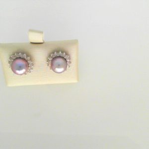 Earrings with Diamond 
14 Karat White Diamond Earrings 
 
 Center Diamond Shape: Round With 2 Round Pearls