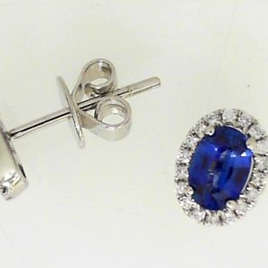 Earrings with Sapphires 
14 Karat White Blue Sapphires Earrings 
 
2 Center Sapphires Shape: Oval; Colour: Blue Round Diamond 0.13 ctw