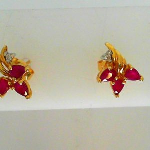 Estate Earrings With Rubies 
14 Karat Yellow Rubies Earrings 
 Gram Weight 2.21 
6 Center Rubies Shape: Pear With 2 Round Diamonds
