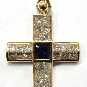Sapphire Estate Pendant 
18 Karat Yellow Blue Sapphire Pendant 
Gram Weight 4.85 Chain Style: No Chain 
1 Center Sapphire 0.40ct Shape: Princess; Clarity: VS; Colour: Blue With 30 Princess Diamonds 2.50 ctw