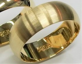 Yellow 14 Karat Satin Band Estate Ring Width 7 mm 
Size: 8.5 
Gram Weight 6.5 gr