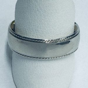 White 14 Karat Polished Band Estate Ring 
Size: 9.5 
Gram Weight 7.84 gr