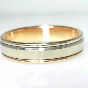 Yellow/White 14 Karat Polished Band Ring 
Size: 10 
Gram Weight 6.78 gr