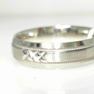 White 10 Karat Satin Band Ring 
Size: 10 
Gram Weight 5.98 gr