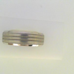 White 10 Karat Satin Band Ring 
Size: 10 
Gram Weight 7.73 gr