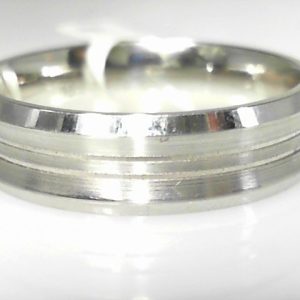 White 10 Karat Satin Band Ring 
Size: 10 
Gram Weight 6.62 gr