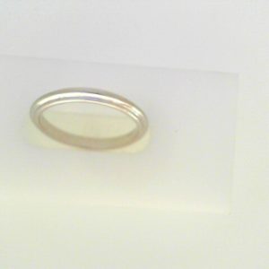 White 18 Karat Polished Band Ring 
Size: 6 
Gram Weight 2.53 gr
