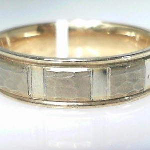 Yellow/White 10 Karat Hammered Band Ring 
Size: 10 
Gram Weight 6.71 gr