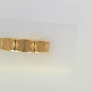 Yellow 10 Karat Satin Band Ring 
Size: 10 
Gram Weight 4.44 gr
