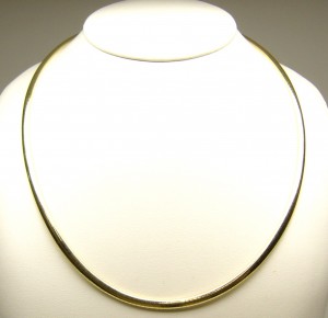 Yellow/White 18 Karat Polished Omega Estate Chain Width 4 mm 
Length 17 in 
Gram Weight 24.8 gr