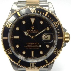 Estate Rolex Divers Year: 1991
Vendor Style #: 16613 Submariner SN: X298542 Oyster
40mm 18K/Stainless Steel
Dial: Black plots 
Box Included/Papers Included
Condition Very good
1 Year Warranty