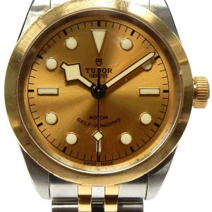 Estate Rolex Dress 
Vendor Style #: 79503 Black Bay 36 two tone SN: i973722 Bracelet (short)
36mm 18K/Stainless Steel
Dial: Champagne plots 
Box Included/Papers Included
Condition Good
1 Year Warranty
