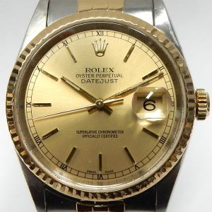 Estate Rolex Dress Year: 2000
Vendor Style #: 001-46300-002 16233 SN: P509897 Jubilee
36mm 18K/Stainless Steel
Dial: Champagne hsh 
Box Not Included/Papers Not Included
Condition Good
1 Year Warranty.
No holes case.