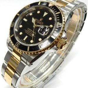 Estate Rolex Divers Year: 2003
Vendor Style #: 16613 Submariner Submariner SN: Y491652 Oyster
40mm 18K/Stainless Steel
Dial: Blck plots 
Box Included/Papers Included/original invoice/ Canadian delivery
Condition Very good
1 Year Warranty