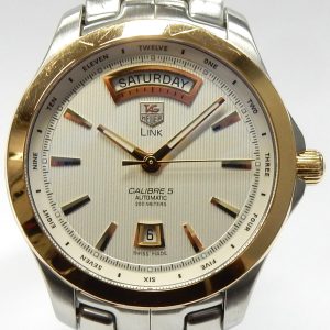 Estate Tag Heuer Dress 
Vendor Style #: Link Day Date WJF2050 SN: RWE8004 
42mm 18K/Stainless Steel
Dial: Silver striped hah 
Box Not Included/Papers Not Included
Condition Good
1 Year Warranty