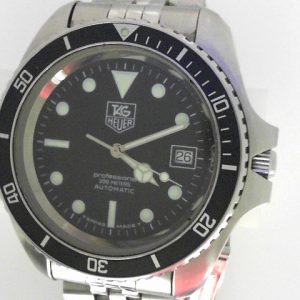 Gents Estate Watch - Tag Sport 1990
Vendor Style #: 1000 Pro 
42 StainlessSteel Bracelet 
Dial:Black
Box Included/Papers Included
Condition Used
1 Year Warranty