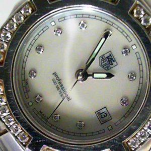 Estate Tag Heuer Sport 
Vendor Style #: WN131J-0 2000 Exclusive SN: YM2565 
28.5mmmm StainlessSteel
Dial: MOP diamond 
Box Included/Papers Not Included
Condition Very good
1 Year Warranty