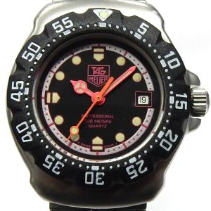 Estate Tag Heuer Divers Year: 1993
Vendor Style #: WA1417 Formula 1 pink 
28.6mmmm StainlessSteel
Dial: Black pink plots 
Box Not Included/Papers Not Included
Condition Good
1 Year Warranty
